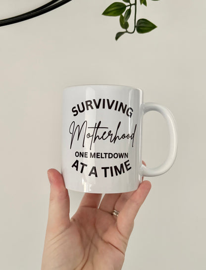 Surviving Motherhood Mug, Funny Mum Life Mug UK, One Breakdown at a Time, Relatable Mum Gift, Tired Mum Coffee Cup, Mum Humour Present